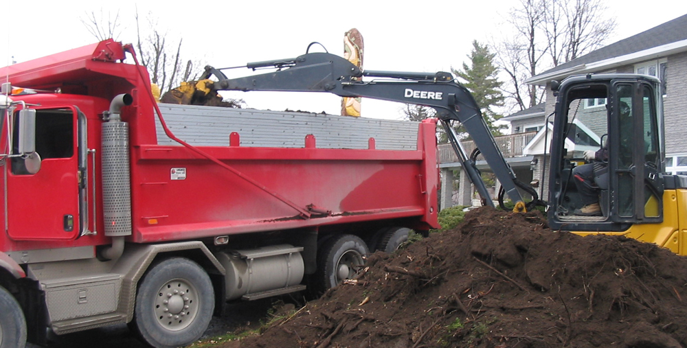 Livraison de terre, sable et gravier à Mirabel - Zone Conteneurs Inc. - Montréal